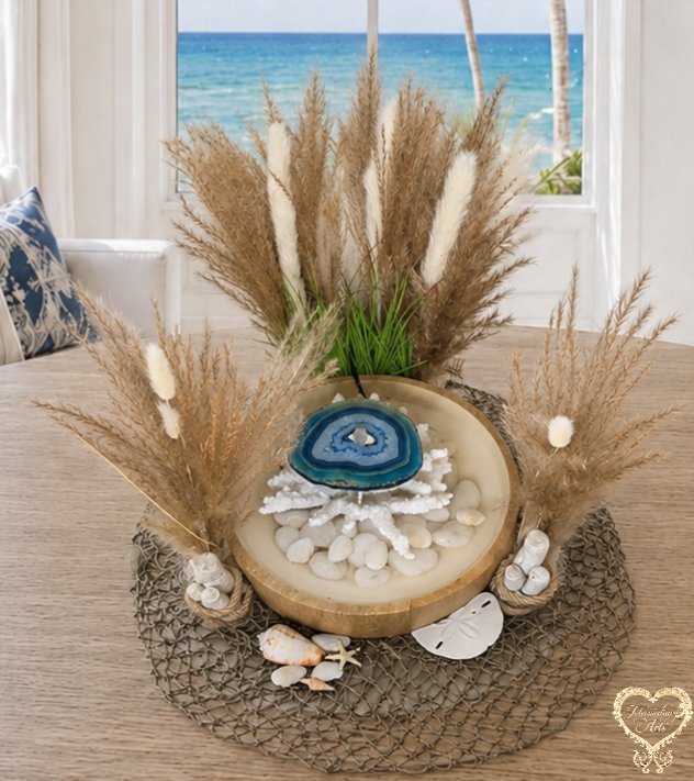 Close view of the blue agate geode and its spout above white coral and smooth white stones